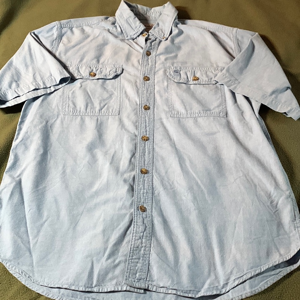 Men’s Carhartt blue, short sleeve button up shirt.  Pockets on chest. Size L